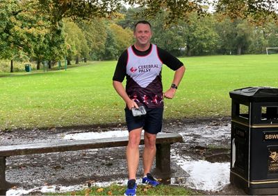 Man in Cerebral Palsy running vest