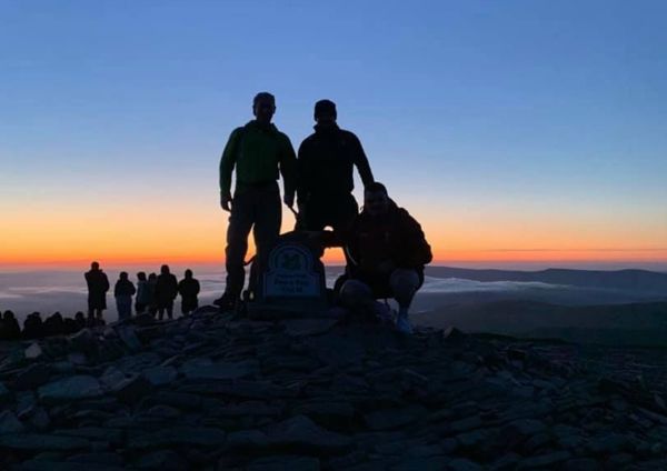 a photo of a sunrise from the top of a mountain
