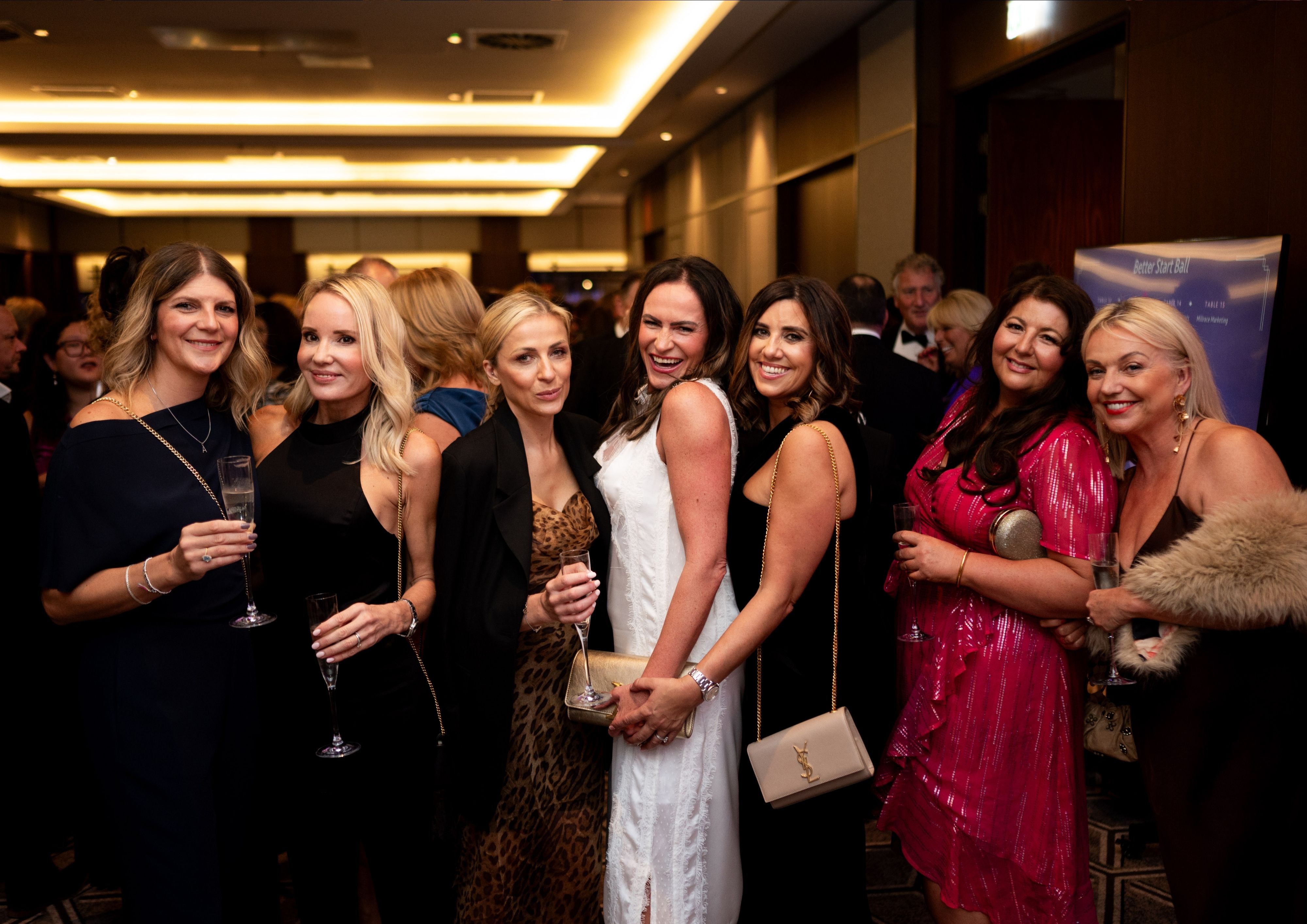 Group of women dressed in black tie at our Better Start Ball.