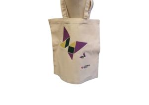 Photograph of Cerebral Palsy Cymru branded tote bag. Canvas with our tangram butterfly.