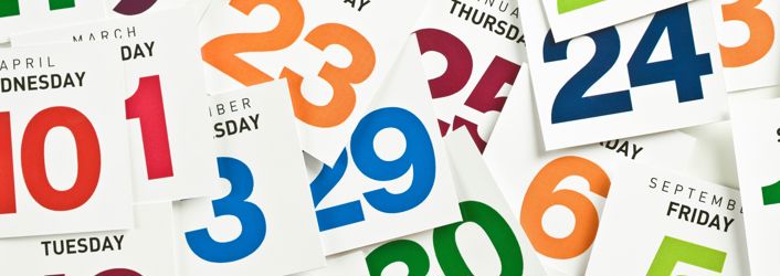 Calendar graphic showing different months and numbers in different colours. 