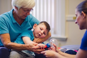 Therapist Supporting Child