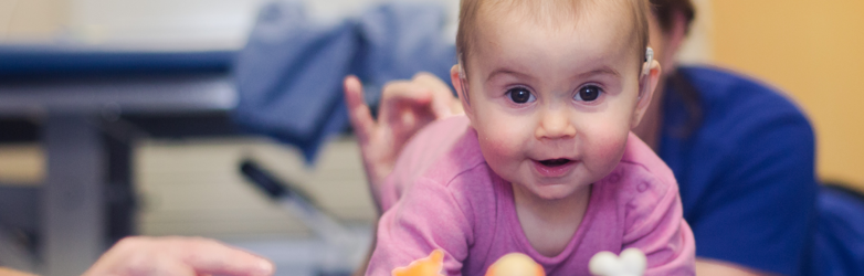 baby girl crawling towards camera 