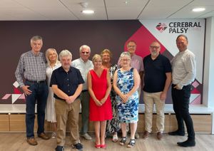 Group photograph of our founding parents standing together in our centre. 