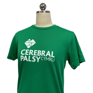Photograph of our green Cerebral Palsy Cymru sports top. (Cerebral Palsy Cymru logo is in white).