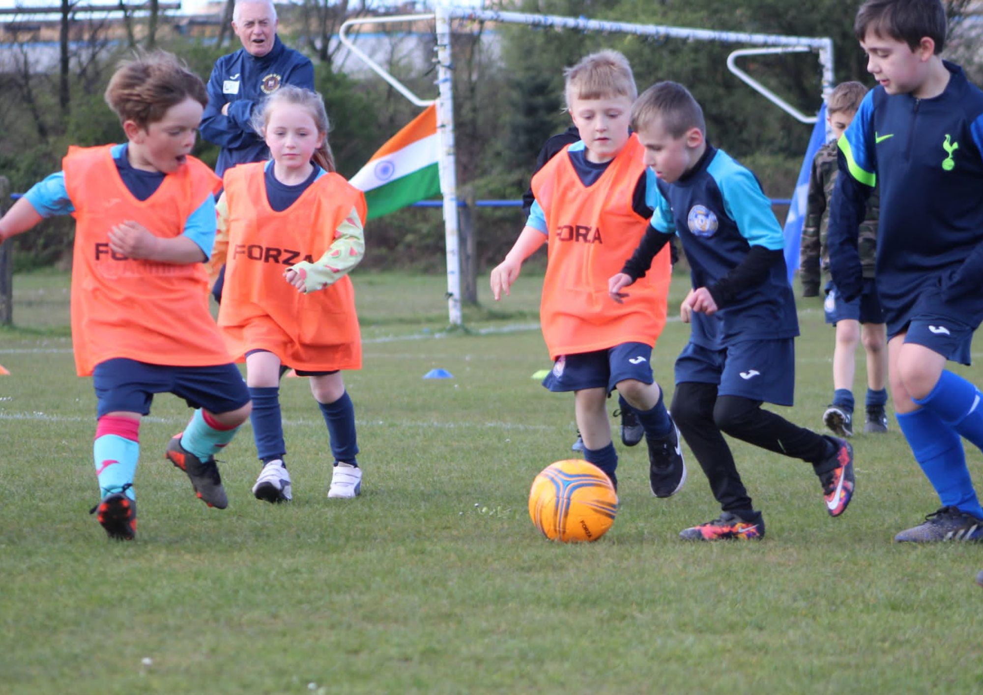 children playing football