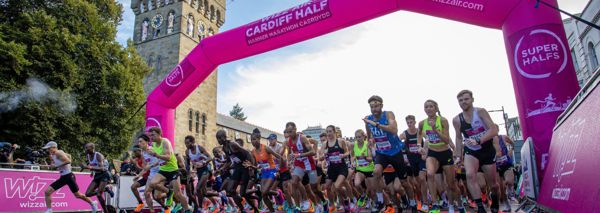 Photograph of runners beginning their race during Wizz Air Cardiff Half.